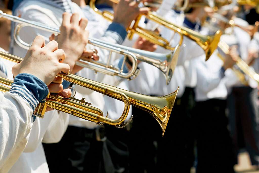 Brass students in a large high school music program.